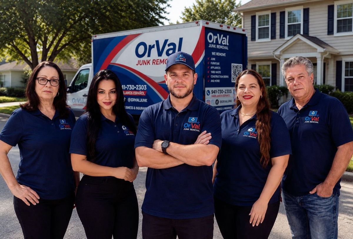 The Orval Junk Removal crew standing in front of their branded van